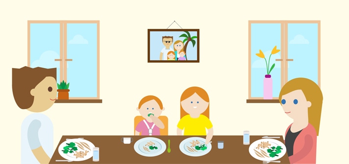 Familia cenando juntos
